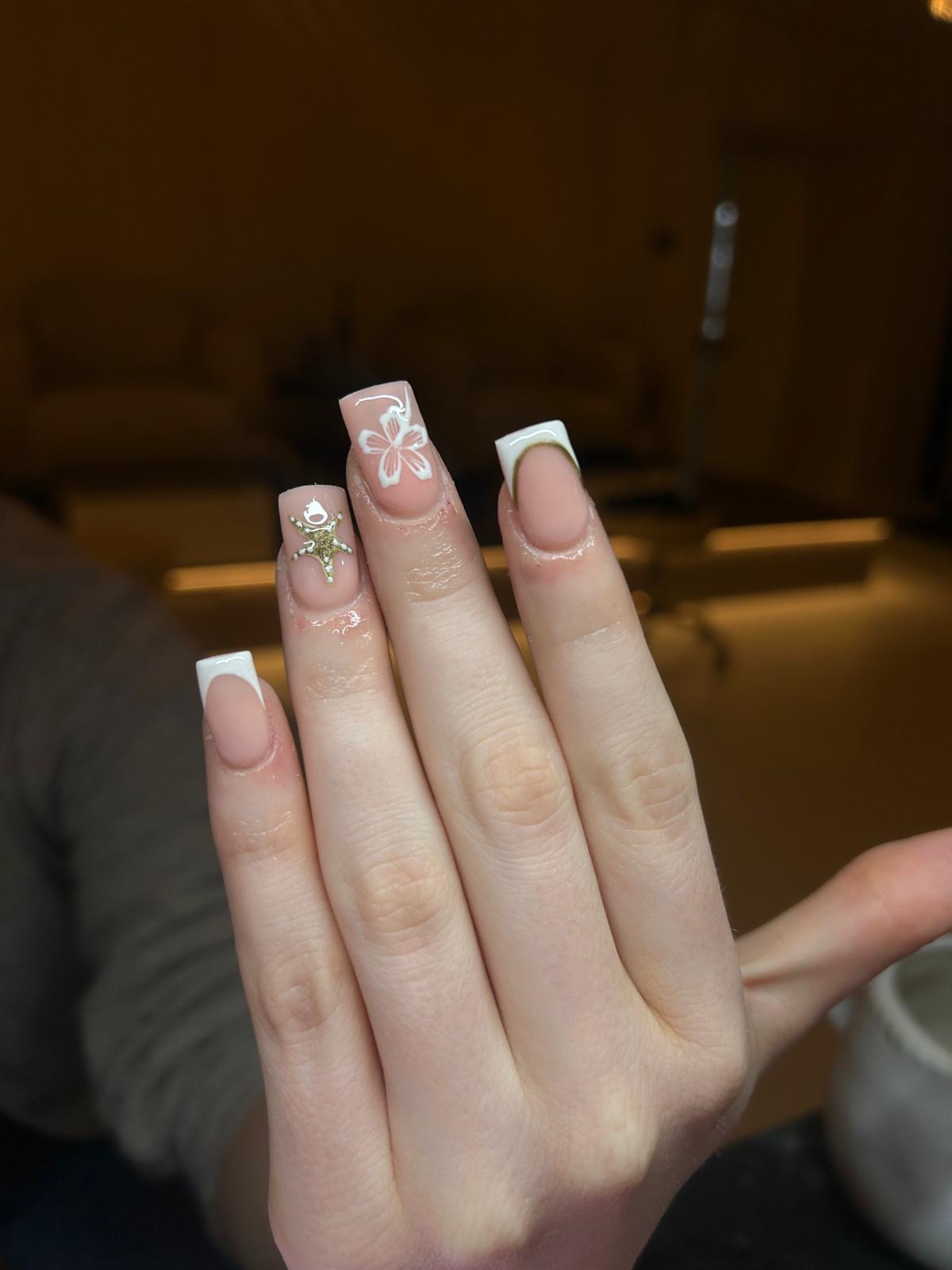 White French tips with hand-painted floral nail art